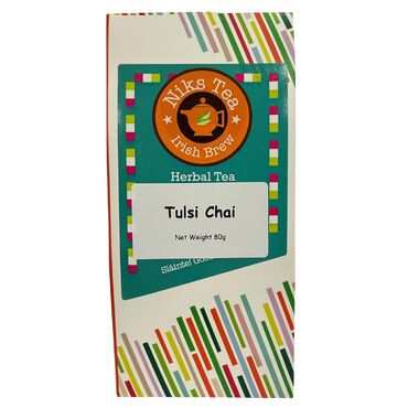 Niks Tulsi Chai Tea Tulsi herb (34,5%), rooibos rasps, ginger bits, cardamom, coconut chips (coconut, sugar), cinnamon sticks (5%), cinnamon (5%), rose pepper, cloves, flavouring black pepper, safflower blossoms