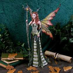 The green woman figurine