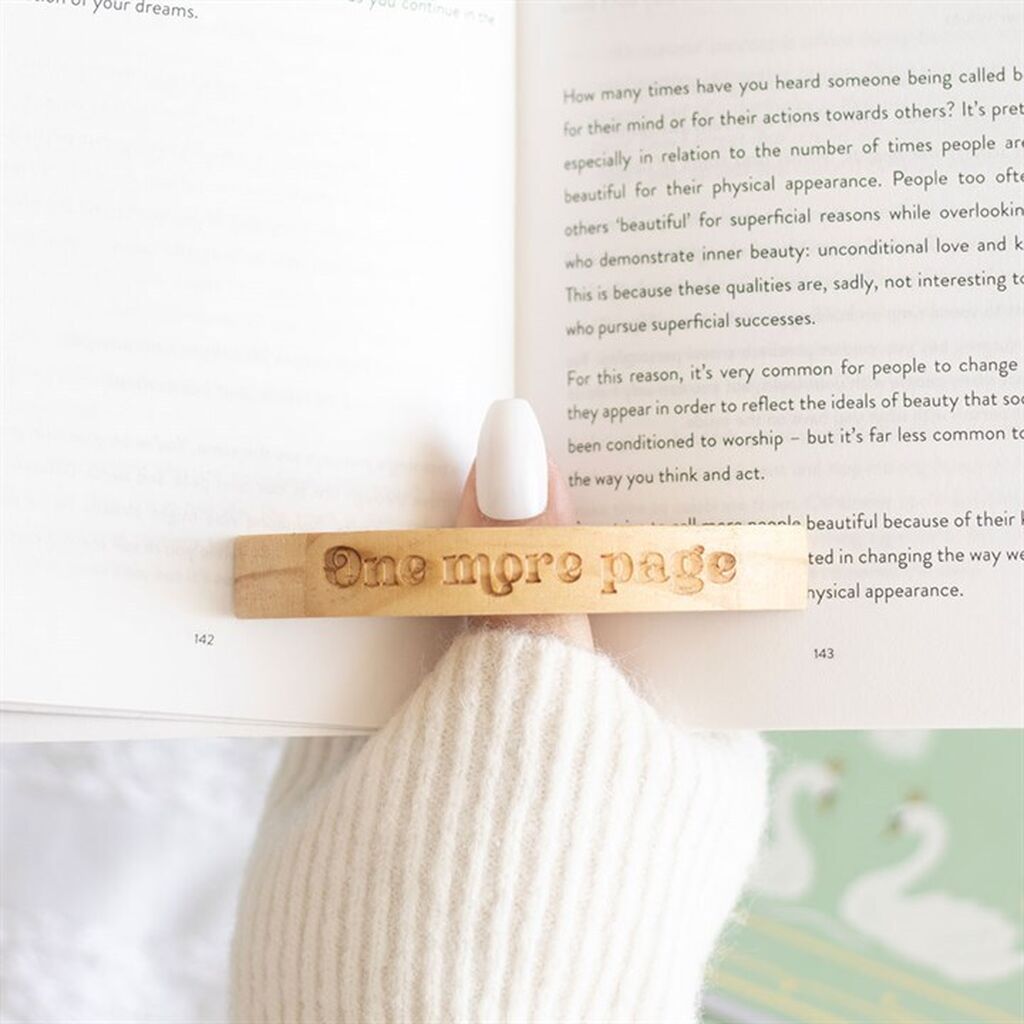 One more page thumb holder