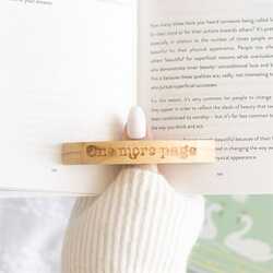 One more page thumb holder