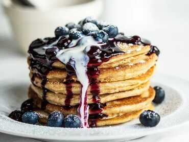 Wholemeal Kefir Pancakes with Blueberry Sauce
